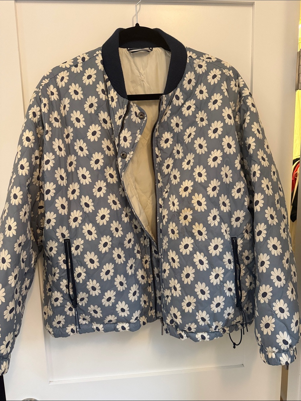 THE GREAT. Blue Floral Daisy Bomber Jacket with White Flowers